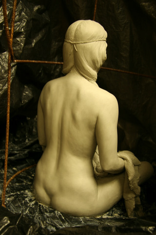 3/4 Angle view of back of Indian Woman.