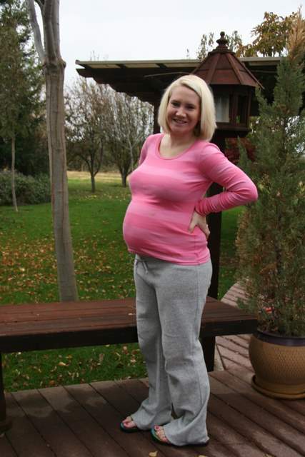 Here's Kristy with her cute pregnant belly all ready for her sculpture portrait.