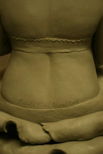 Kristy's baby girl name is written on her back on the sculpture.