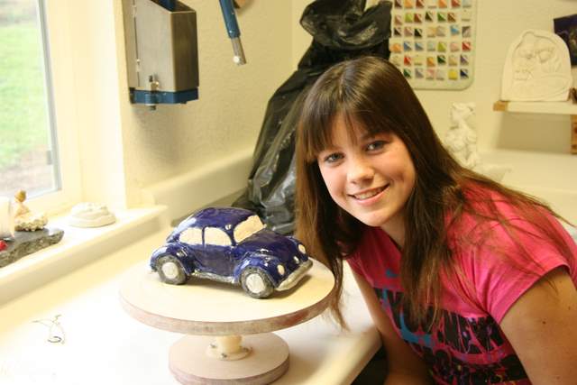 My niece and her Volkswagen ceramic bug.