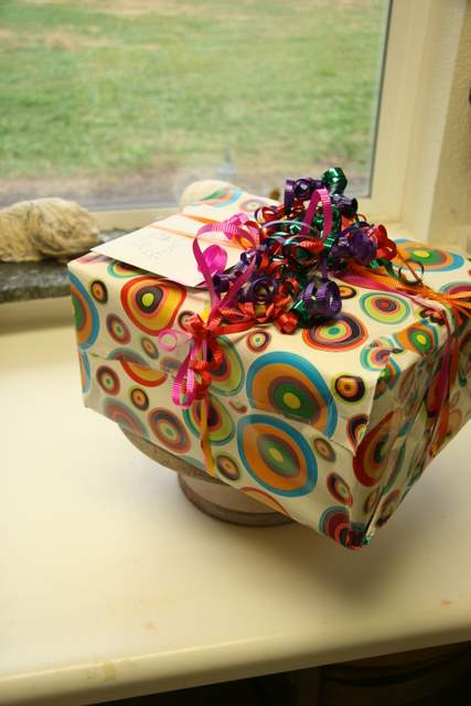 Present wrapped with Volkswagen sculpture inside.