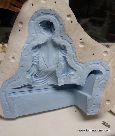 Here's the sculpture's back side in the mold.